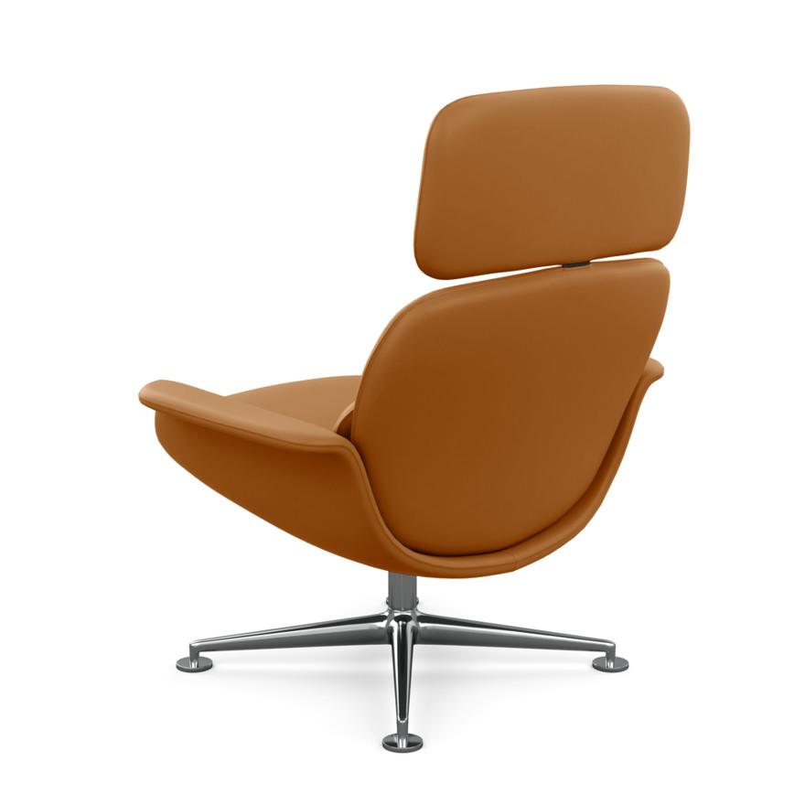 tan swivel armchair